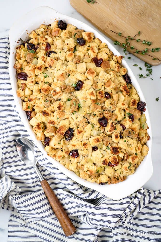 Healthier Thanksgiving cornbread and sausage stuffing with cranberries and fresh thyme.