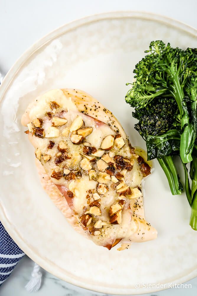 Chicken cordon bleu with ham, Swiss cheese, and almond breadcrumbs with broccoli