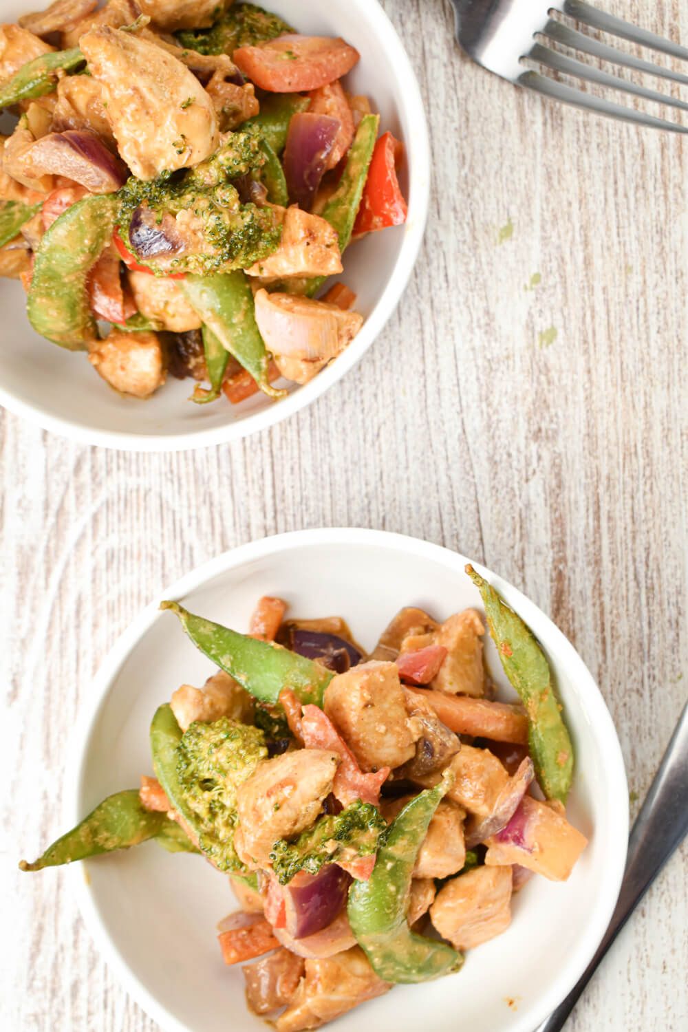 Peanut chicken breast and vegetables in a spicy peanut sauce with rice.