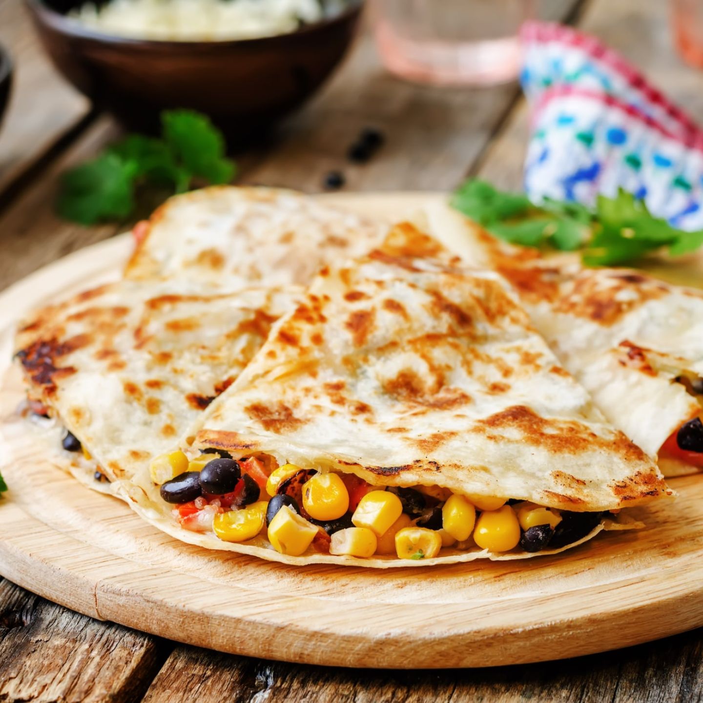 Black Bean and Corn Quesadillas in a flour tortilla with cilantro.