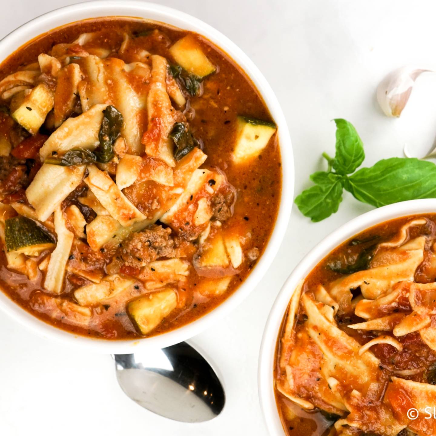 Slow Cooker Vegetarian Lasagna soup with noodles, zucchini, and more.