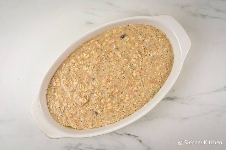 Carrot cake oatmeal in a baking dish before going in the oven.