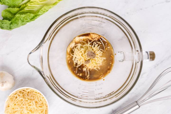 Greek yogurt, parmesan cheese, lemon juice, and olive oil to make Caesar dressing.