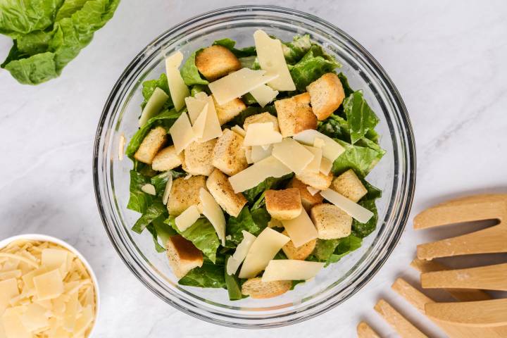 Healthy caesar salad with croutons, Parmesan cheese, and Romaine lettuce.
