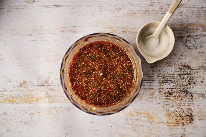 A blended adobo sauce made with toasted chilies, garlic, and spices is ready to be used for slow-cooked Mexican beef.