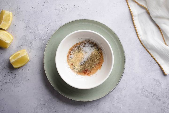 Homemade spice mixture with lemon for rotisserie chicken.