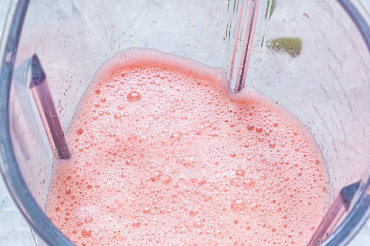 Blended watermelon, honey, lime juice, and mint in a blender.